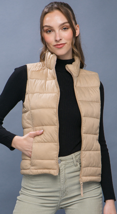 
                  
                    High Neck Padded Puffer Vest with Storage Pouch
                  
                