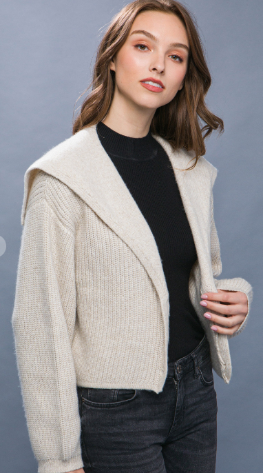 
                  
                    Knit Button Up Cardigan with Wide V Neckline
                  
                