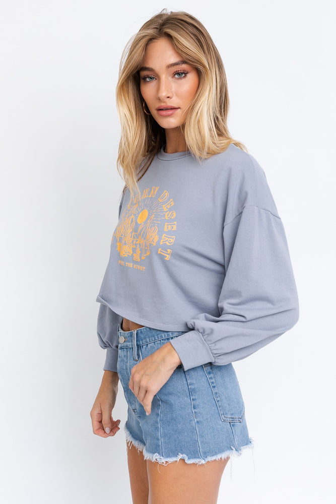 
                  
                    LONG SLEEVE WESTERN DESERT GRAPHIC WITH HIGH SLIT
                  
                