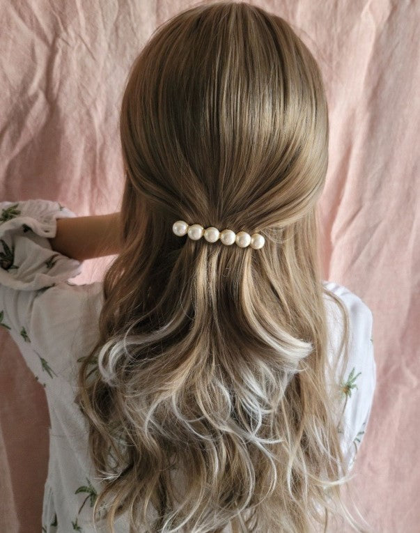 
                  
                    Pearl hair clip
                  
                
