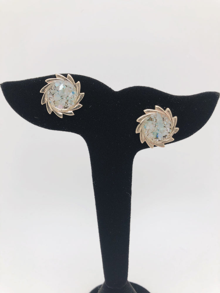 
                  
                    Saw-toothed wheel earrings
                  
                