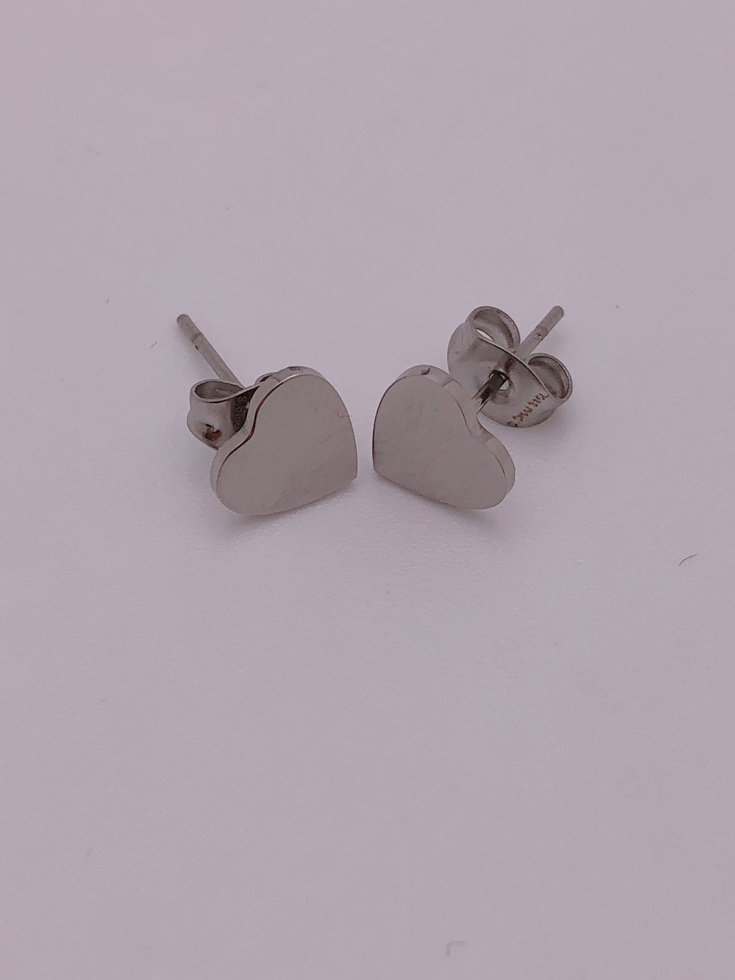 
                  
                    Surgical stainless steel earrings
                  
                