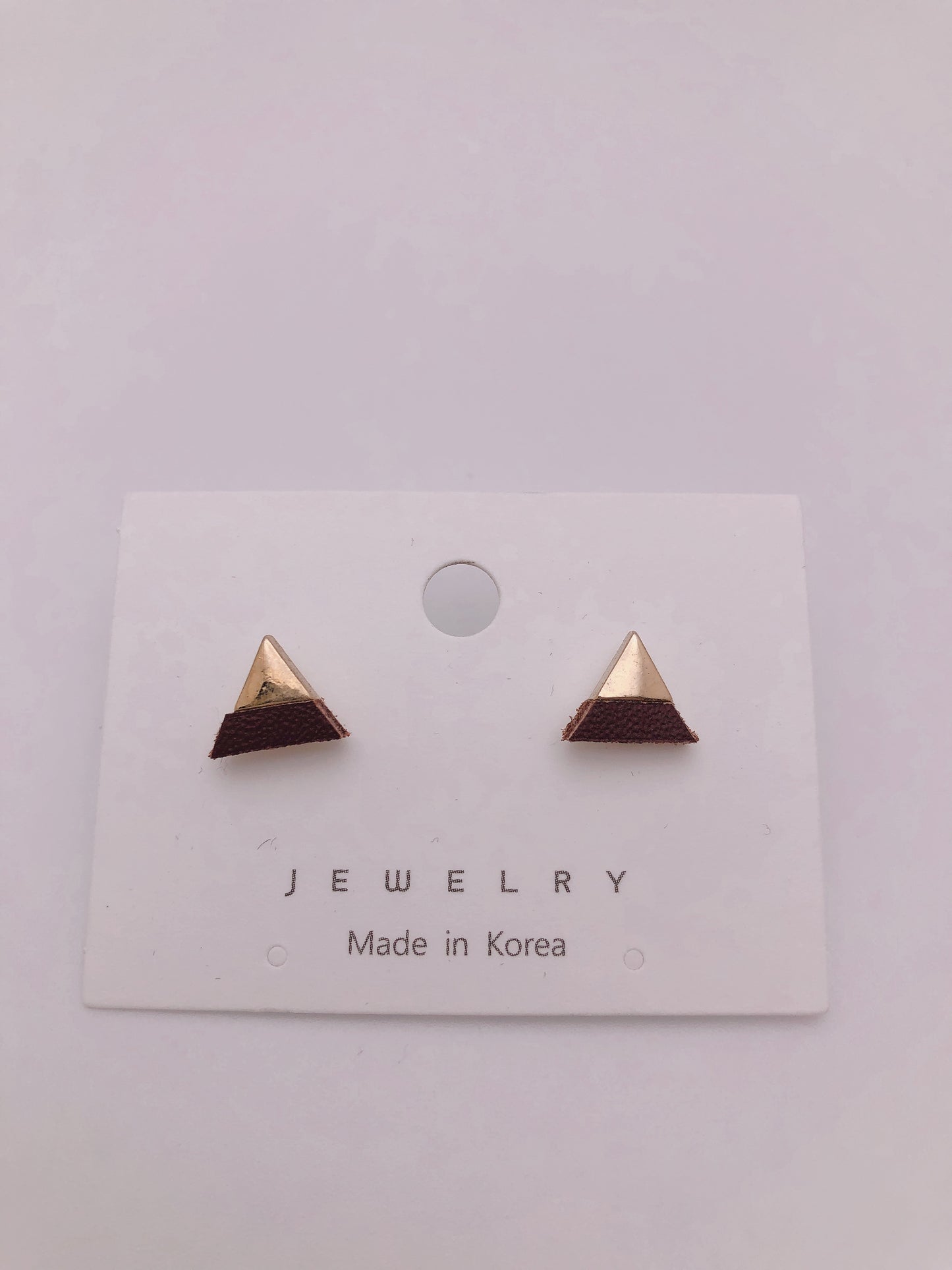 
                  
                    Triangle earrings
                  
                