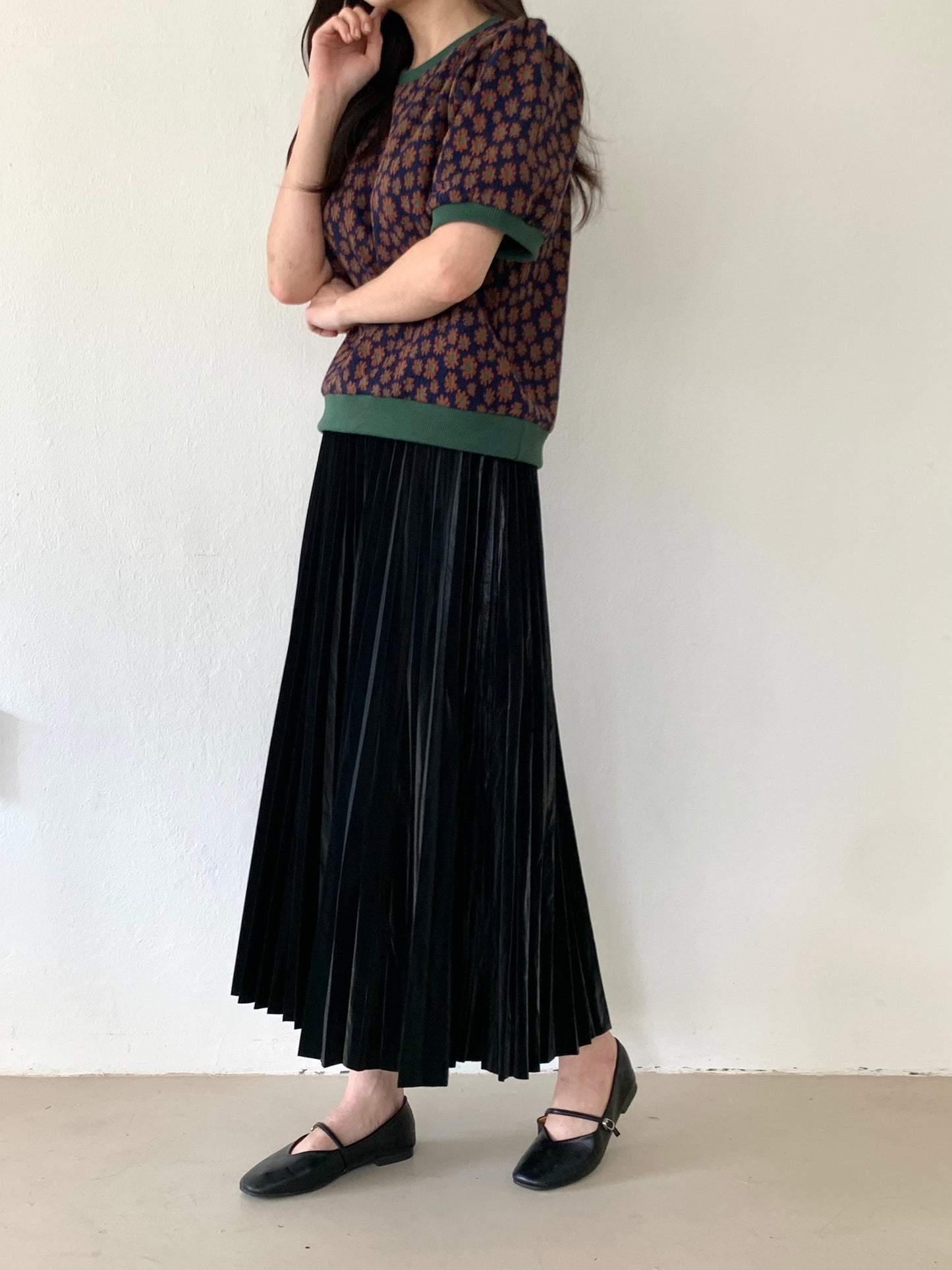 
                  
                    Faux leather Pleated Skirt
                  
                
