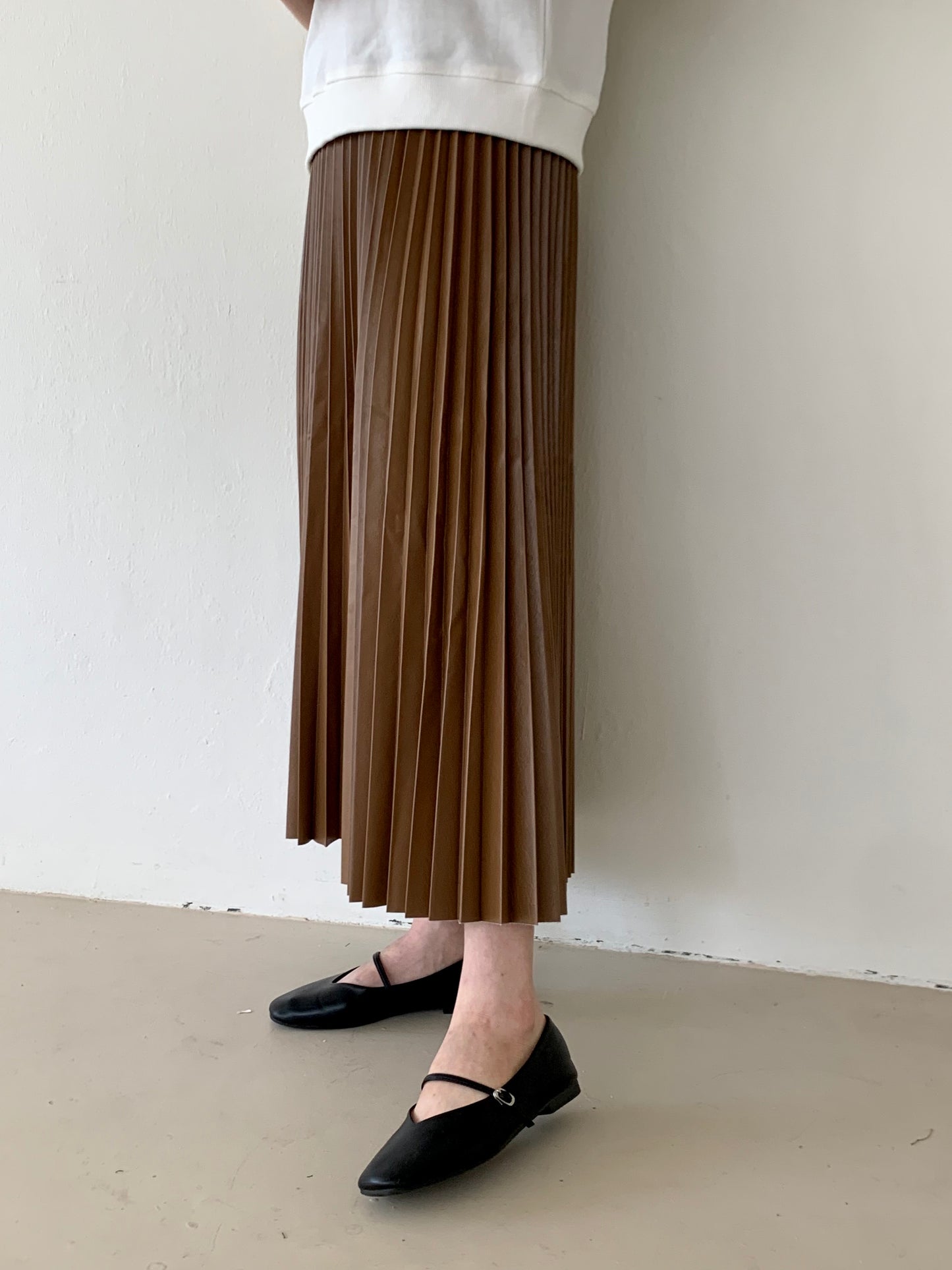 
                  
                    Faux leather Pleated Skirt
                  
                