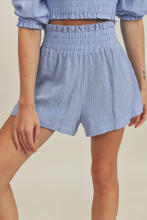 
                  
                    Woven top and shorts
                  
                